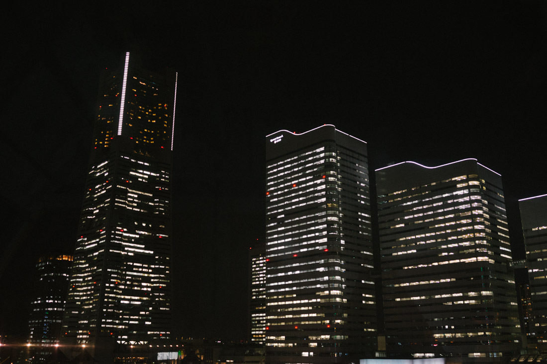 The three Queens Square Towers next to Landmark Tower.
