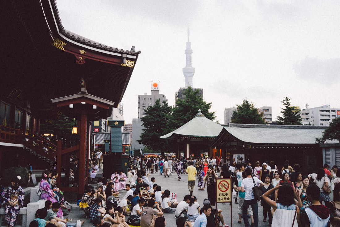 Masses gathered around Senso-ji grounds throughout the day.