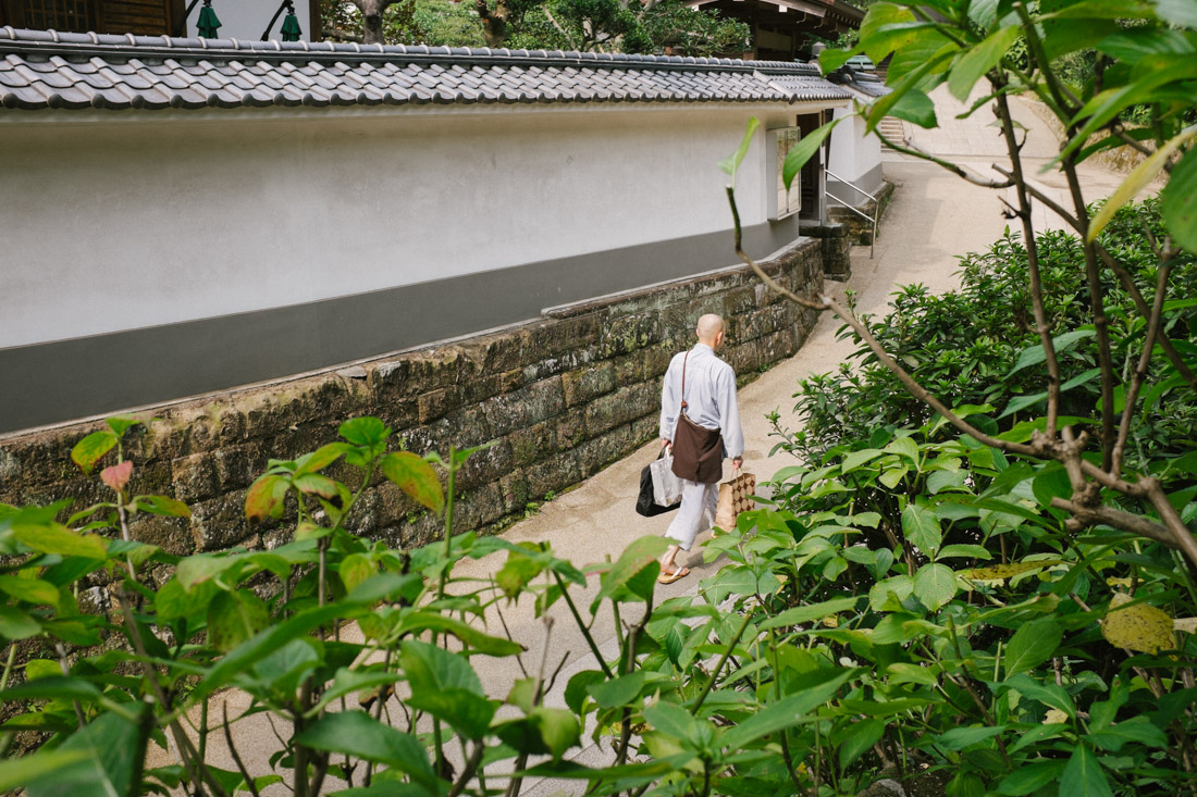 Priest going to the temple.
