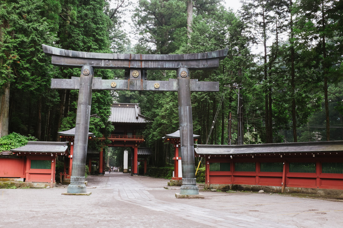 Futarasan entrance tori seen from inside the shrine grounds.