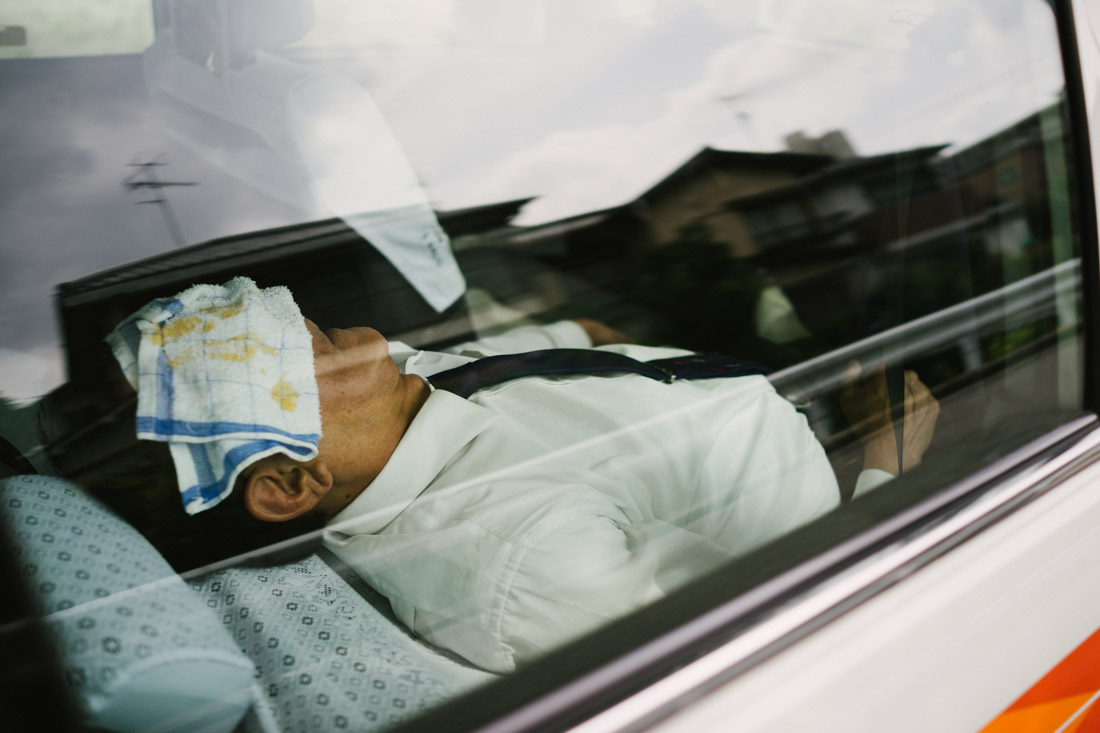 Many taxi drivers leave their cars running to have air conditioning on and catch some zzzs.