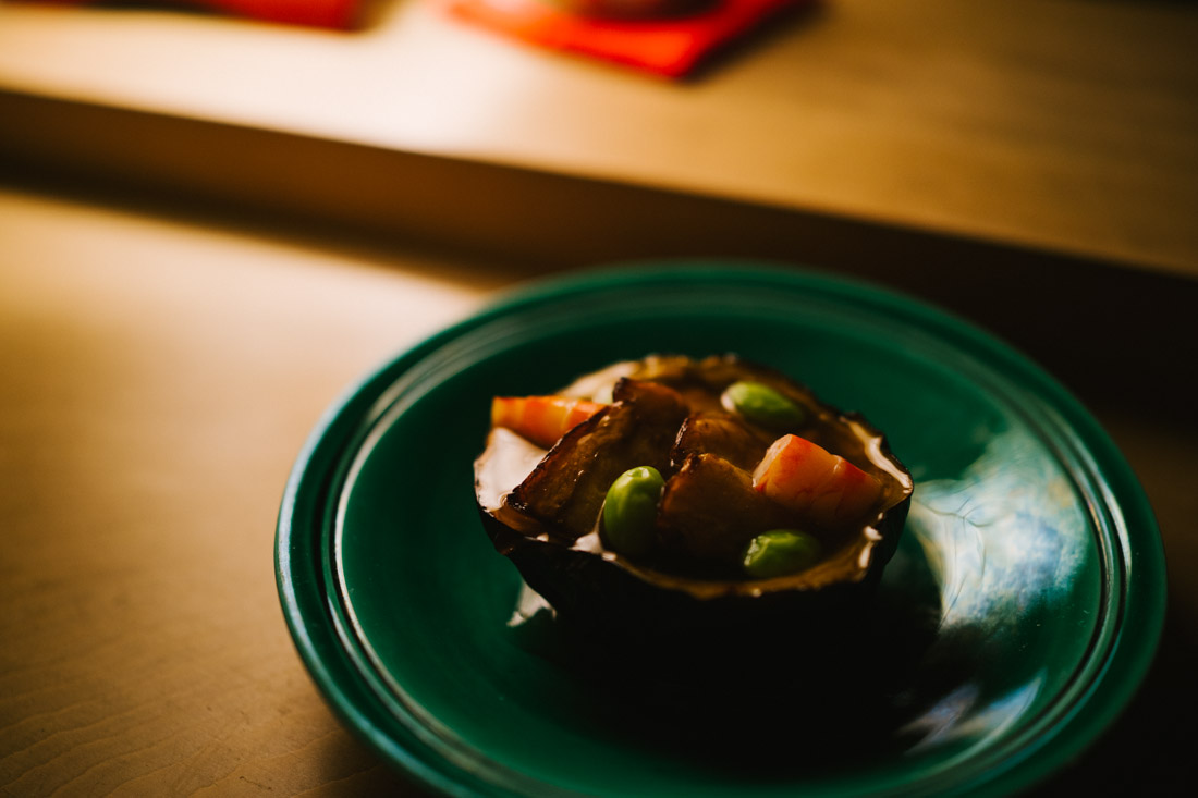 Eggplant shell with shrimp, edamame beans and the eggplant itself in a sweet sauce.